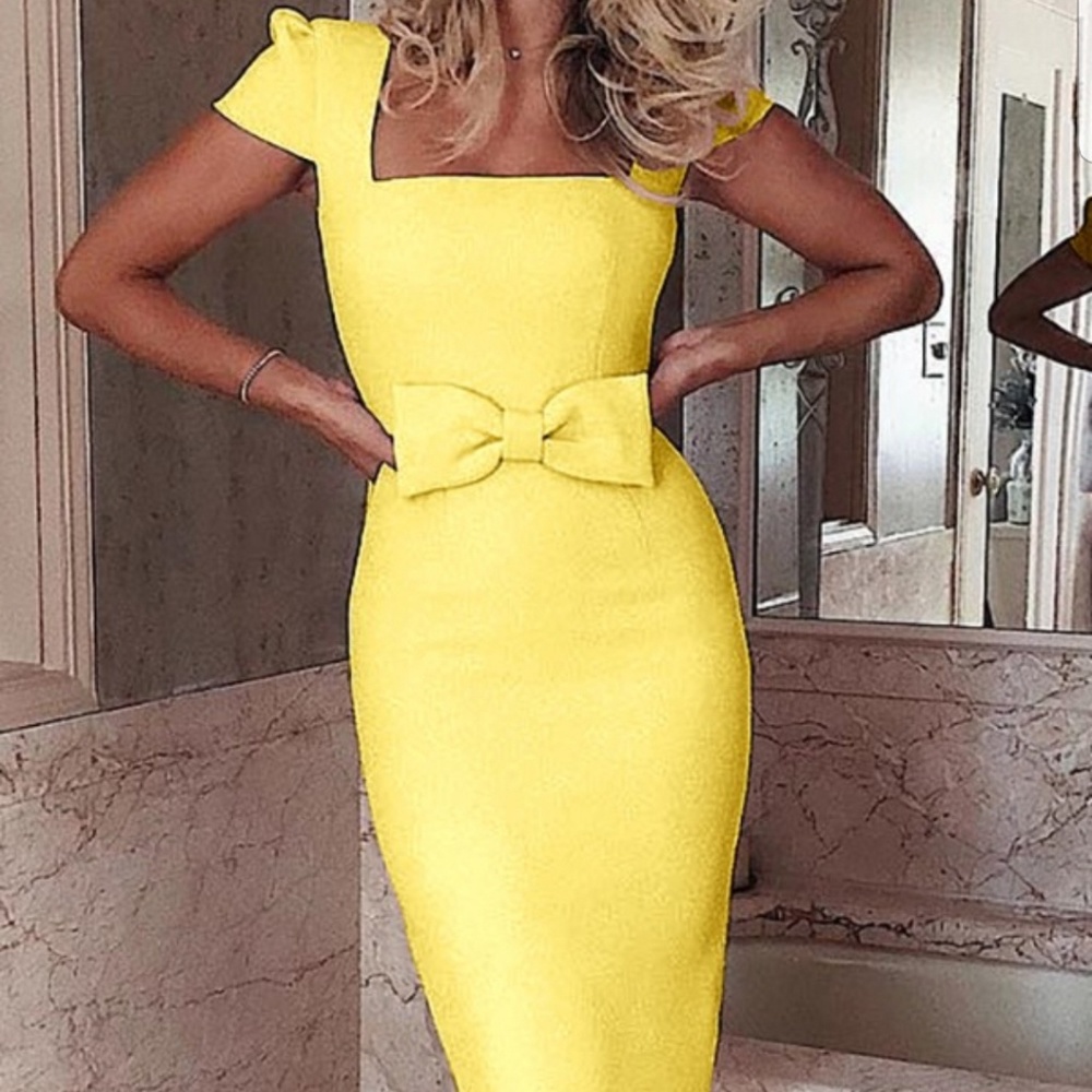 Yellow bow dress.